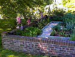 An Herb Garden centrally located within the hertiage rose garden